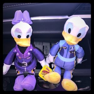 Mickey roadster Racers Donald and Daisy
